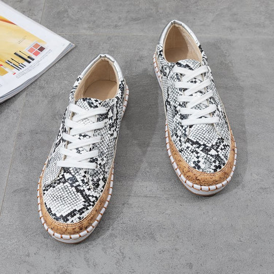 Damen Sneaker mit Korksohle und buntem Schlangenmuster EB