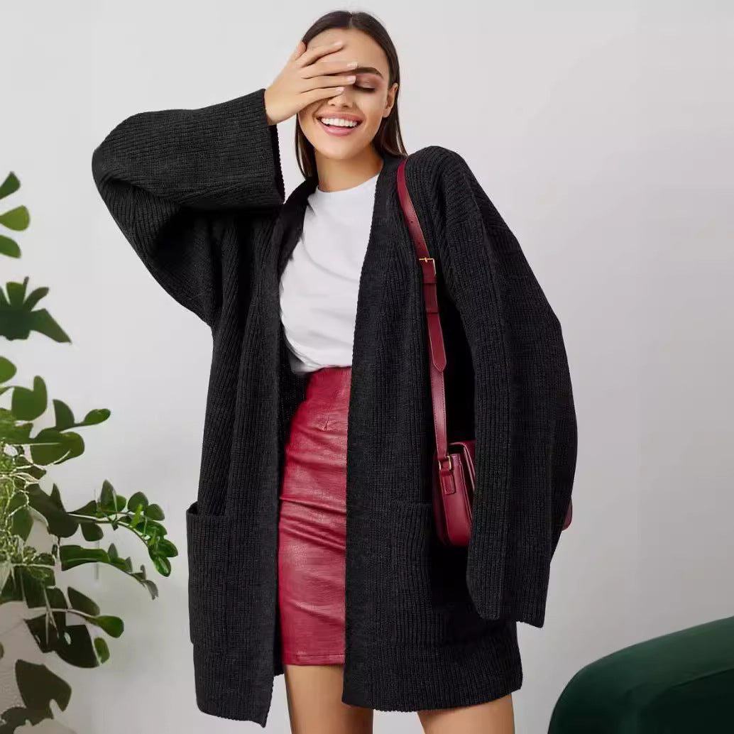 Damen Großer Strickcardigan mit voluminösen Ärmeln und praktischen Taschen EB