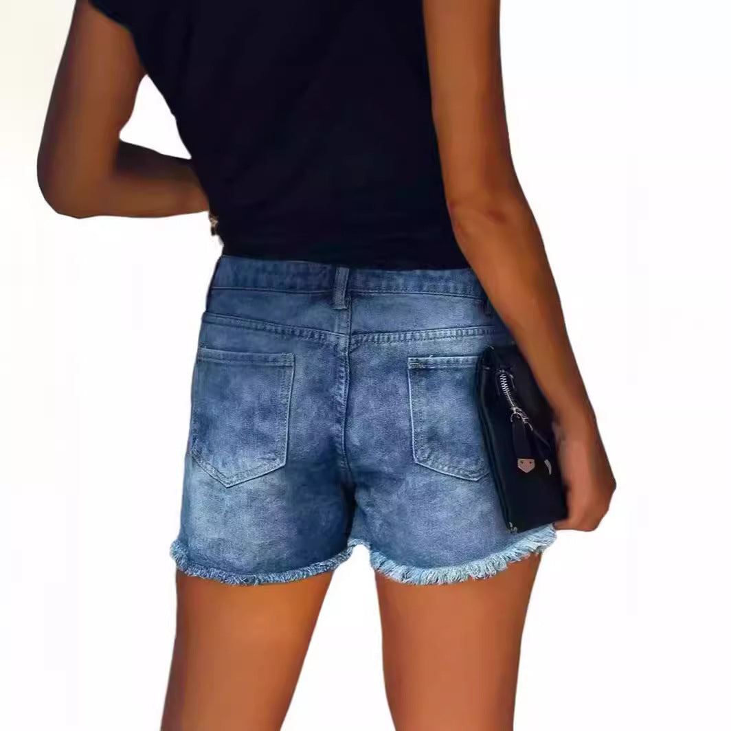 Damen Denim-Shorts mit trendigen Stickdetails und Fransensaum EB