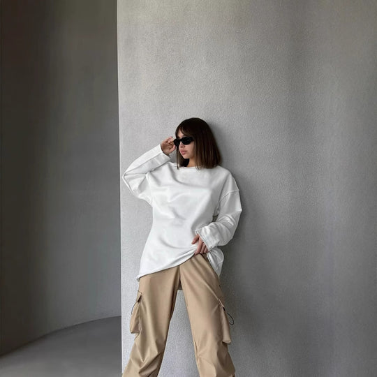 Damen oversized Sweatshirt mit ausgefranstem Saum und verlängerten Ärmeln EB