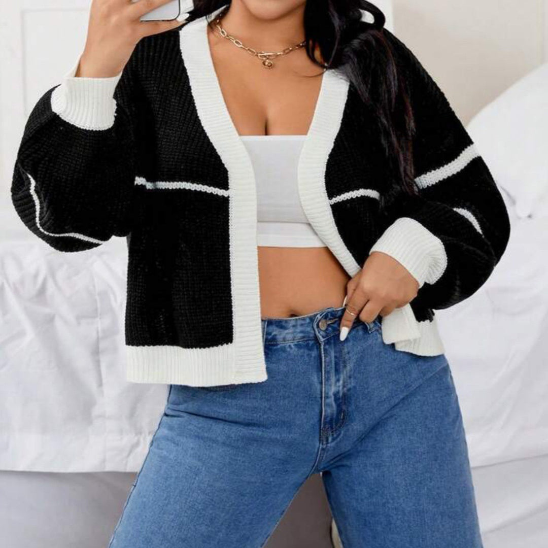 Damen Grobstrickjacke mit weit geschnittenen Ärmeln und auffälligem Design EB