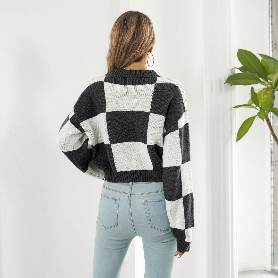Damen Oversized Strickpullover mit modernen Karomuster und hohem Kragen EB