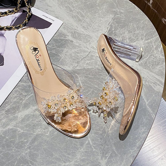 Damen elegante und durchsichtige Mules mit floralem Schmuckdetail EB