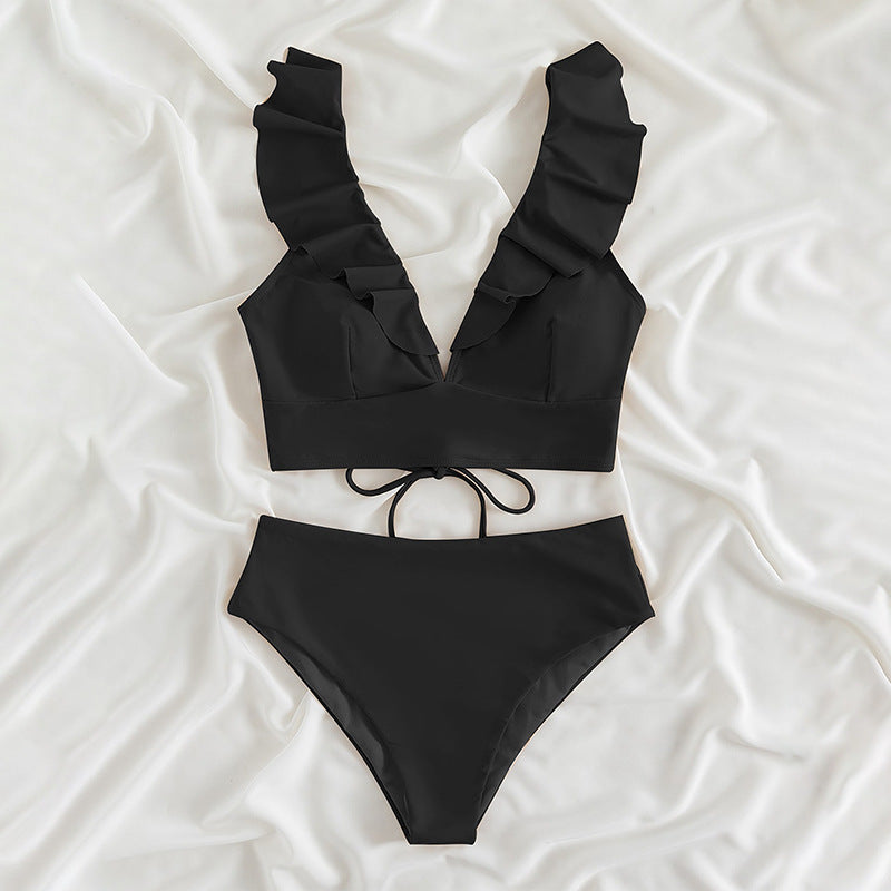 Damen Oberteil mit Rüschen und hohen Bikinihosen EB