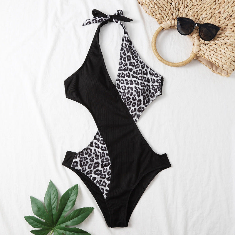 Damen Einteiler Badeanzug mit modernen Cut-Outs und schickem Leo-Muster EB