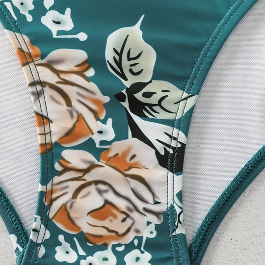 Damen Einteiliger Badeanzug mit elegantem Schnitt und floralem Design EB