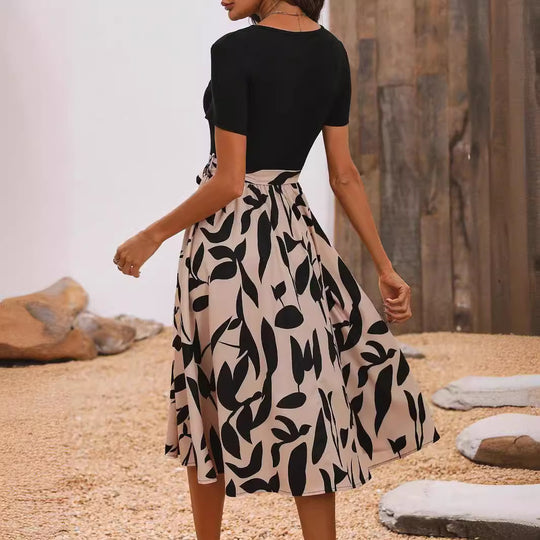 Damen Midi-Kleid mit tailliertem Schnitt und einzigartigem Print EB