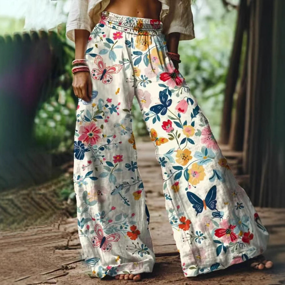 Damen Weite Sommerhose mit buntem Blumen- und Schmetterlingsprint EB