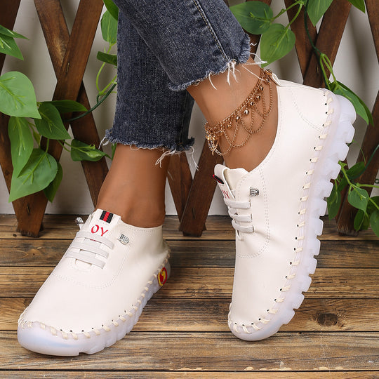 Damen Bequeme Lederoptik-Slipper mit flexibler Profilsohle und Mokassin-Naht EB