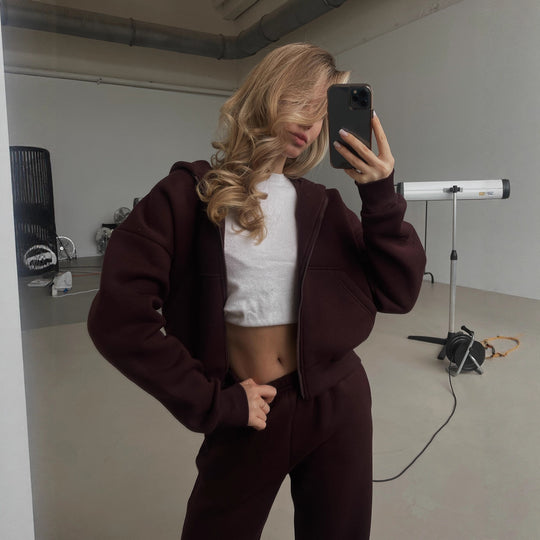 Damen Cropped Kapuzen-Sweatjacke mit Kängurutasche und tailliertem Rippbund EB