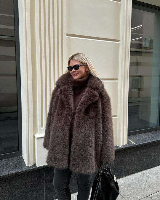 Damen Luxuriöse Kunstfelljacke mit voluminösen Ärmeln EB