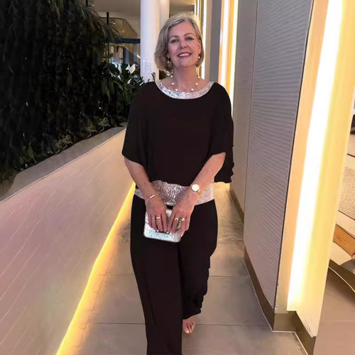 Damen eleganter Jumpsuit mit fließendem Stoff und schickem Taillengürtel EB