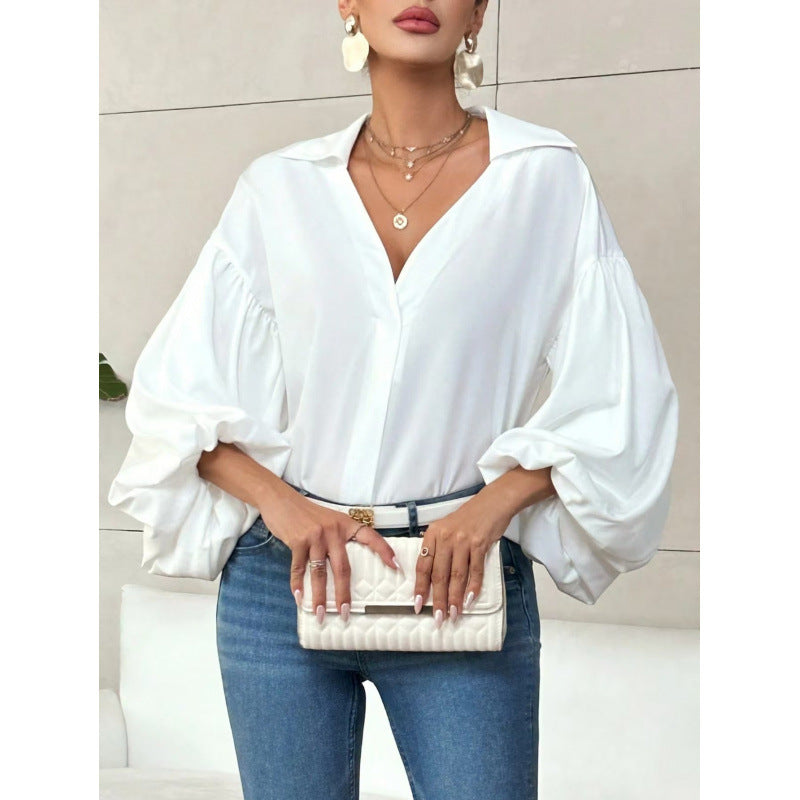 Damen Bluse mit voluminösen Ballonärmeln und elegantem Kragen EB