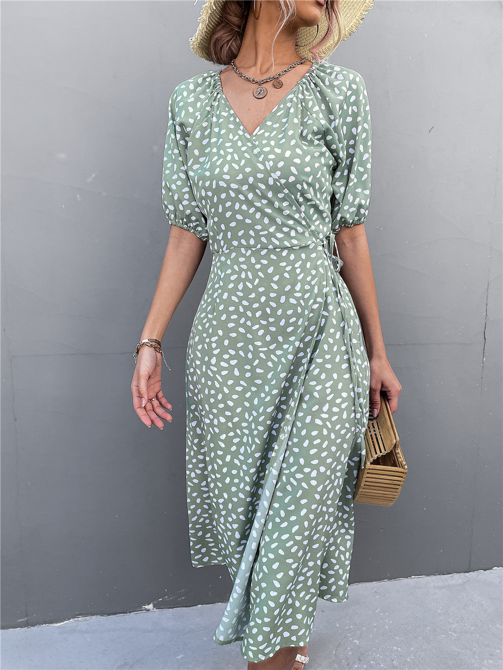 Damen Wickelkleid mit eleganten Puffärmeln und modernem Muster EB