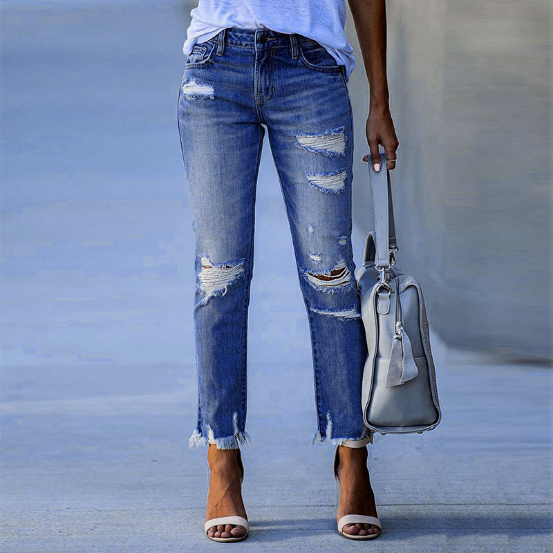 Damen destroyed Jeans mit fransigen Säumen und modischen Rissen EB