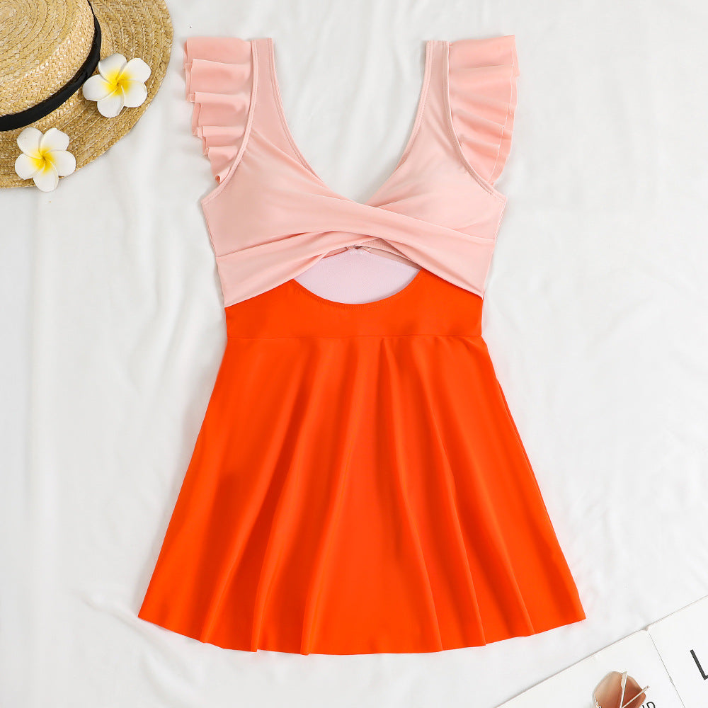 Damen Einteiler-Badeanzug mit femininem Wickeldesign und Cut-Out-Details EB
