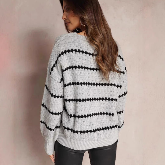 Damen Strickjacke mit markantem Muster und voluminösen Ärmeln EB
