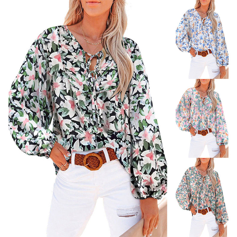 Damen Lockere Bluse mit floralem Muster und voluminösen Ärmeln EB