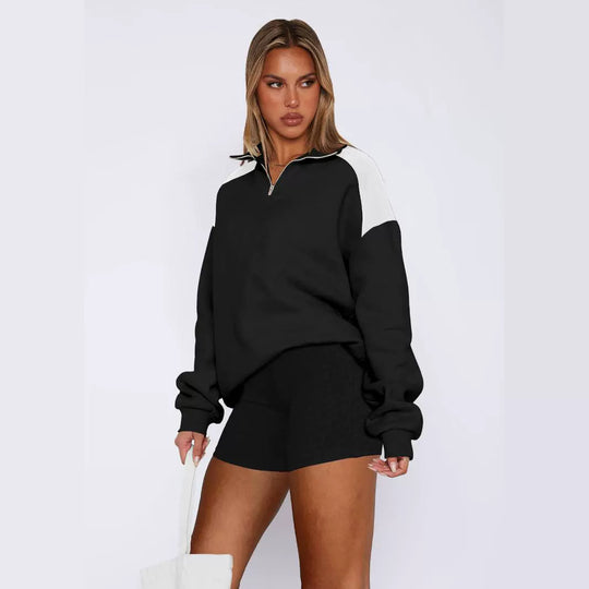 Damen lässiger Sweatshirt mit halbem Reißverschluss und kontrastierenden Ärmeln EB