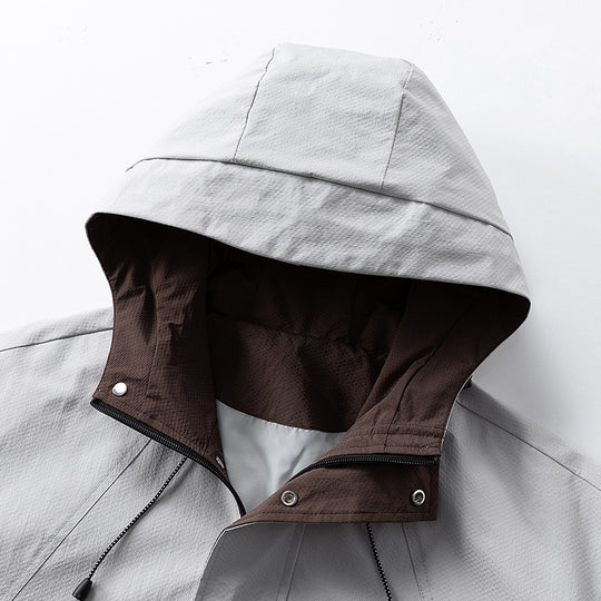 Unisex leichte winddichte Outdoorjacke mit Kapuze, wasserabweisender Außenhülle und verstellbarem Saum EB