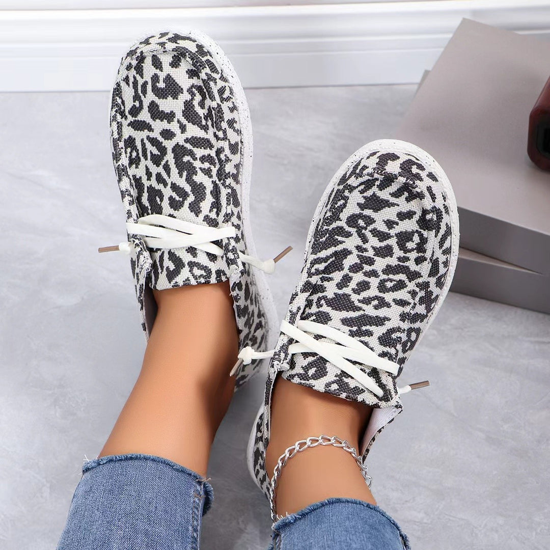 Damen Sneakers im modernen Schwarz-Weiß-Tiermotiv EB