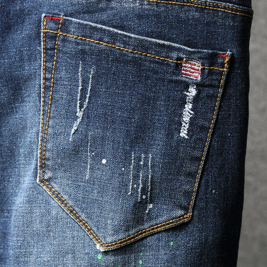 Herren Ripped Slim Fit Jeans mit kreativen Farbklecksen und modischem Destroyed-Look EB