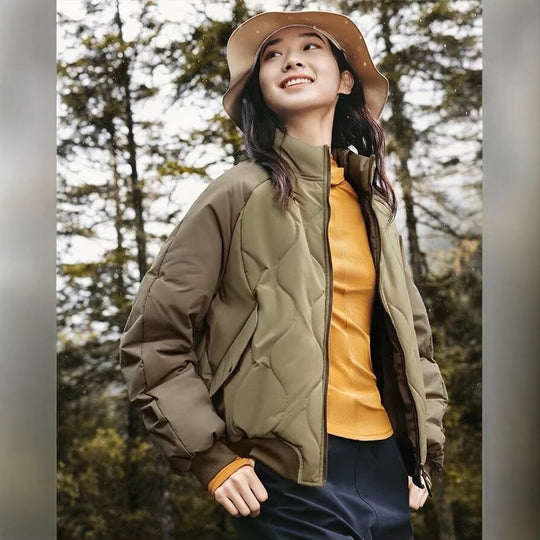 Damen Steppjacke im sportlichen Design mit hohem Kragen und elastischen Bündchen EB