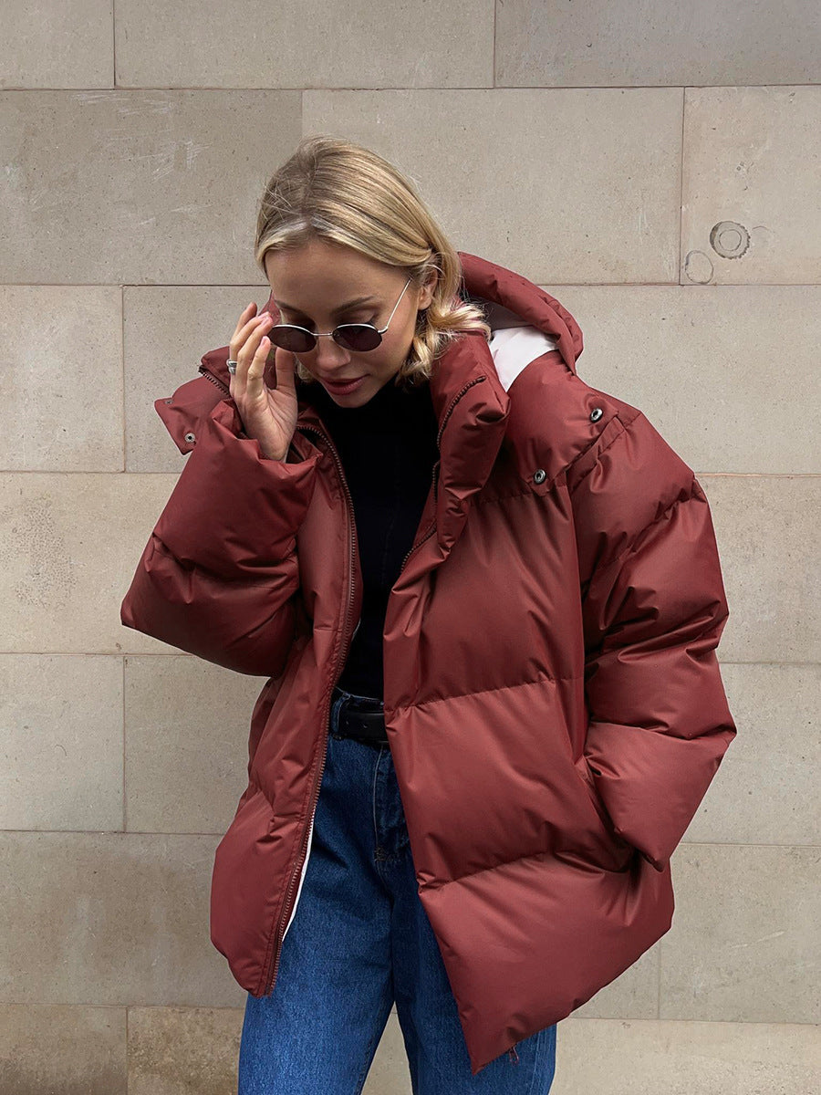 Damen sportliche Daunenjacke mit hohem Kragen und voluminösem Schnitt EB