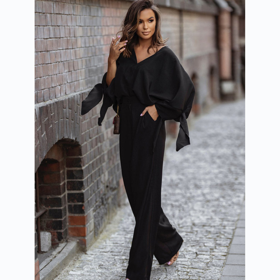 Damen Eleganter Jumpsuit mit weiten Ärmeln und schmalem Taillengürtel EB