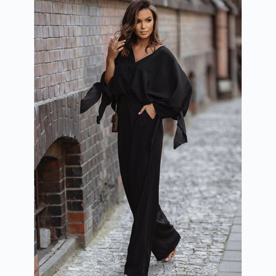 Damen Eleganter Jumpsuit mit weiten Ärmeln und schmalem Taillengürtel EB