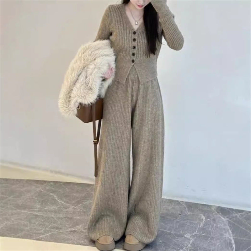 Damen Elegantes gestricktes Jumpsuit mit Knopfdetails und weitem Bein EB