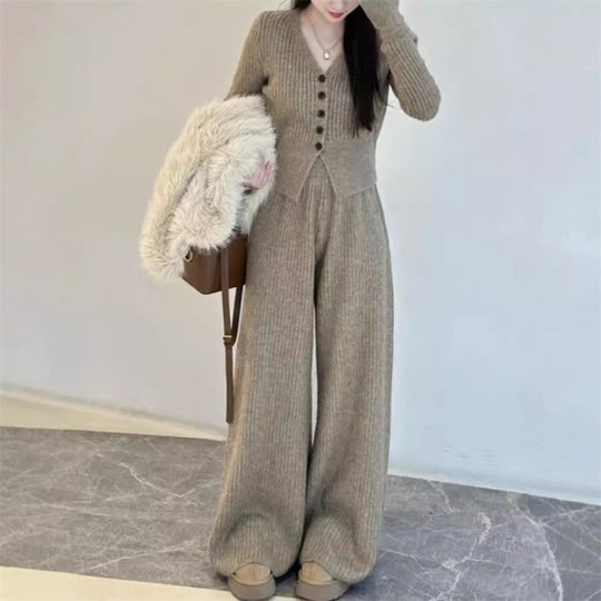 Damen Elegantes gestricktes Jumpsuit mit Knopfdetails und weitem Bein EB