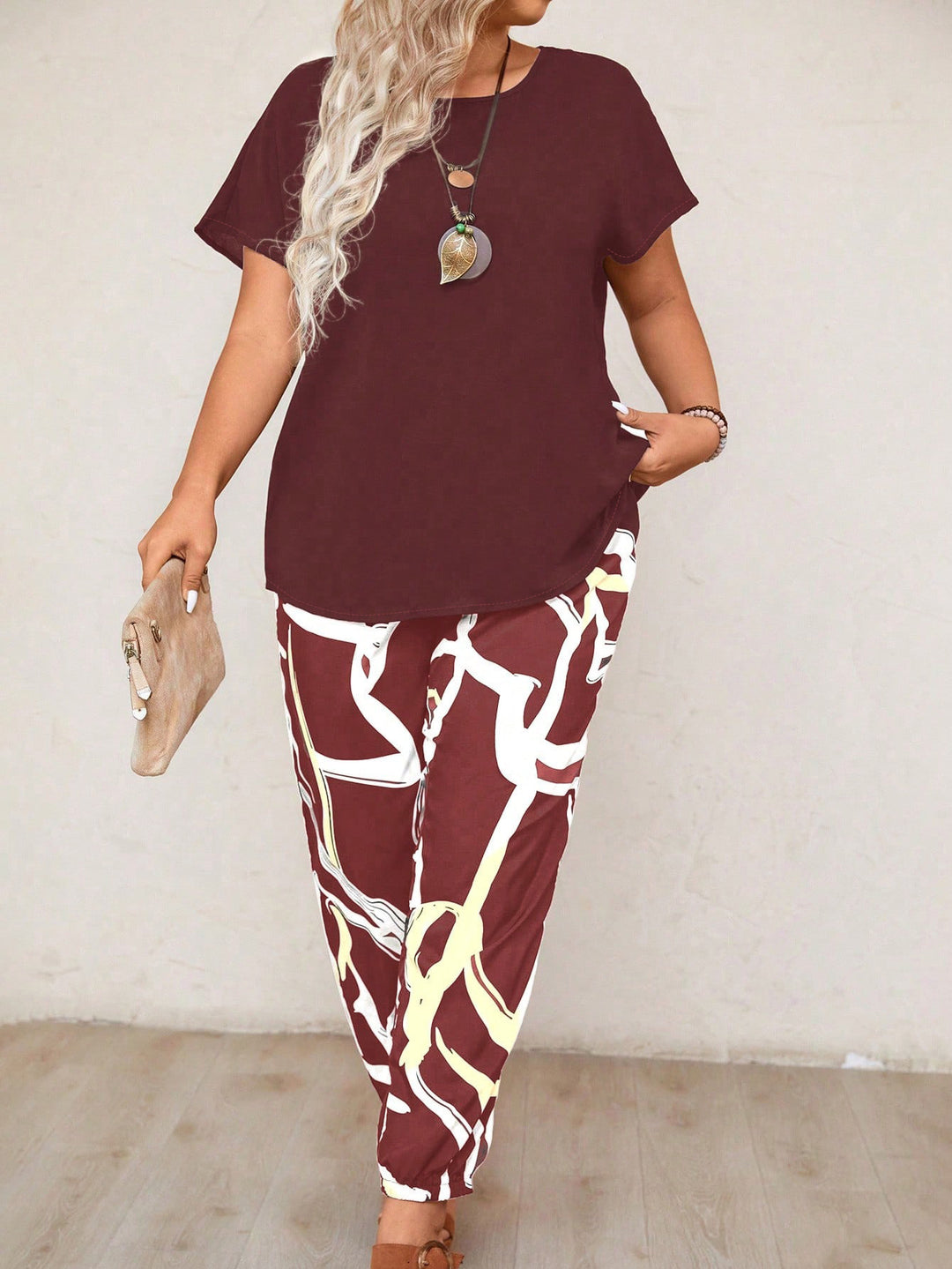 Damen lässiges Set aus Oberteil und Jogginghose mit floralem Muster EB