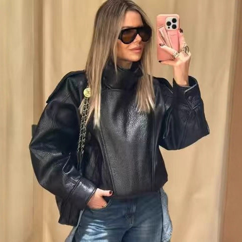 Damen nan oversize Kunstlederblouson mit hohem Stehkragen, asymmetrischer Druckknopfleiste, Schulterklappen und elastischem Saum EB