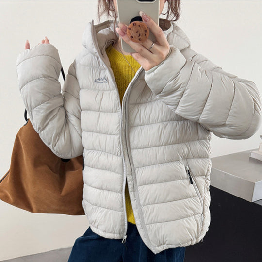 Damen ultraleichte Pufferjacke mit abnehmbarer Kapuze und elastischem Saum EB