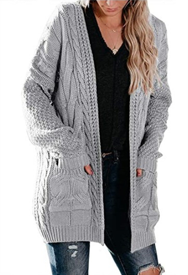 Damen Grobstrickjacke mit femininer Silhouette und praktischen Taschen EB