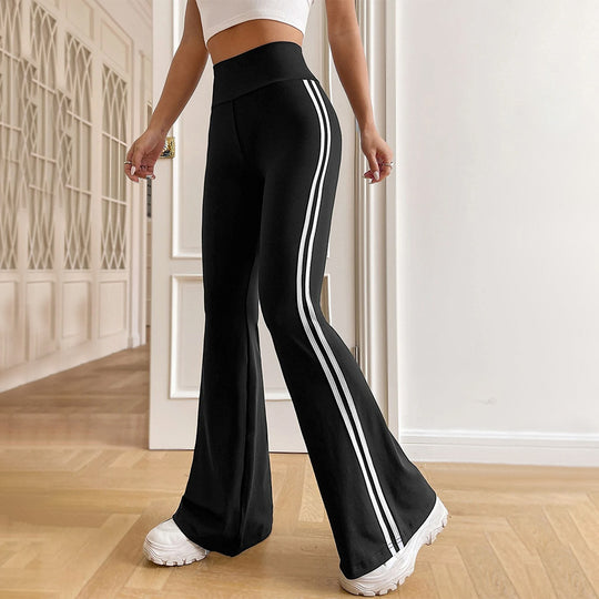 Damen hochgeschnittene Flared-Sporthose mit taillenformendem Komfortbund und seitlichen Kontraststreifen Eichborn Berlin