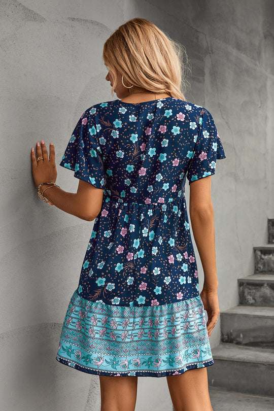 Damen Freizeitkleid mit floralem Vintage-Muster und Knopfdetails EB