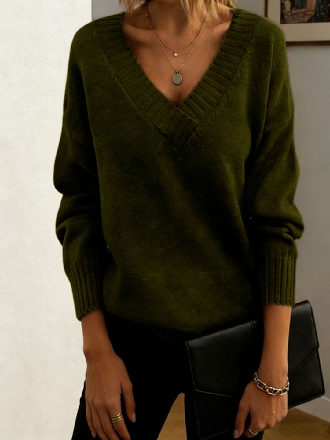 Damen Feinstrickpullover mit tiefem V-Ausschnitt und überschnittener Schulter EB