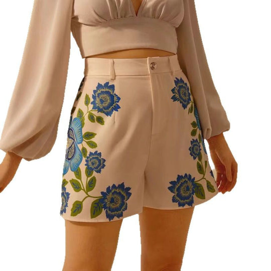 Damen Shorts mit floralem Druck und dekorativen Details EB