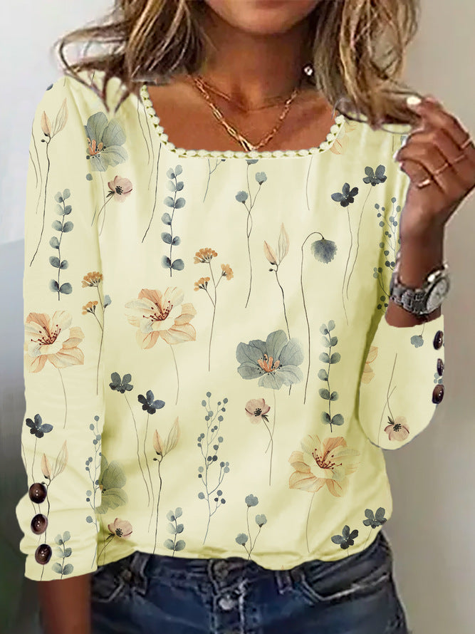 Damen Bluse mit floralem Druck und dekorativen Knopfdetails EB