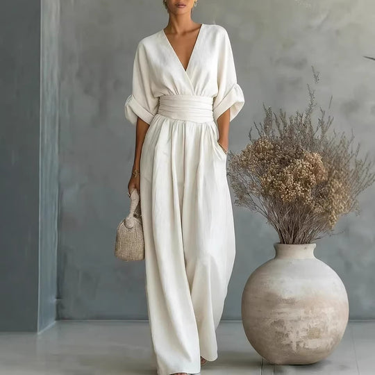 EB | Eleganter Ärmelloser Jumpsuit mit Tiefem V-Ausschnitt, Taillenbund und Weitem Bein