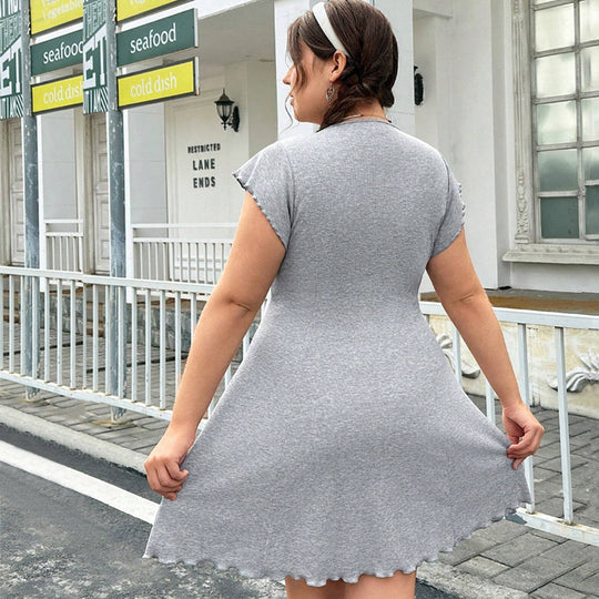 Damen lässiges Jersey-Kleid mit verspielt geschwungenem Saum und dekorativen Bändern EB