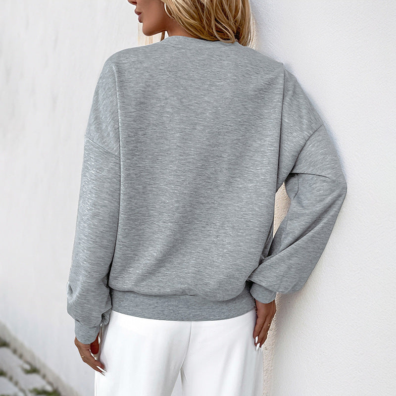 Damen Sweatshirt mit innovativen Cut-Out-Akzenten und Paillettenverzierung EB
