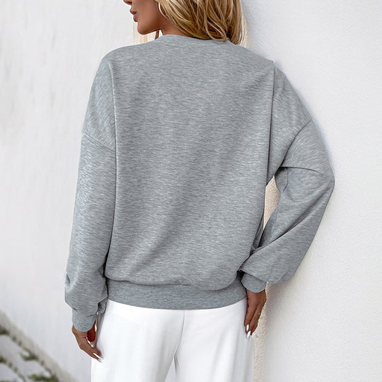 Damen Sweatshirt mit innovativen Cut-Out-Akzenten und Paillettenverzierung EB