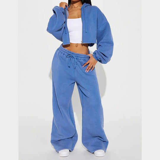 Damen gekürztes Reißverschluss-Kapuzenoberteil und hochtaillierte weite Fleece-Jogginghose Set Eichborn Berlin