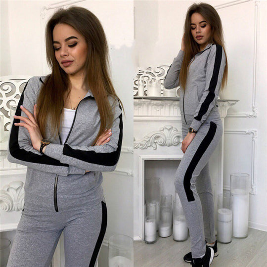 Damen Jogginganzug aus Stretchmaterial mit seitlichem Kontraststreifen und Reißverschluss EB