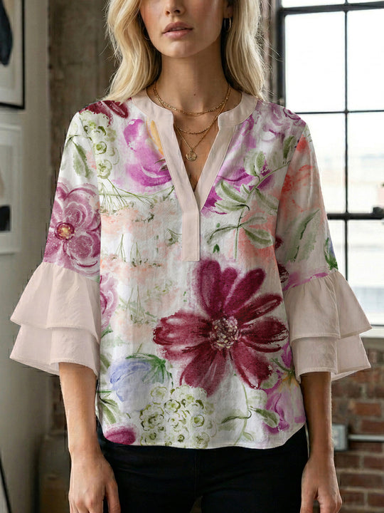 Damen Bluse mit voluminösen Ärmeln und floralem Design EB