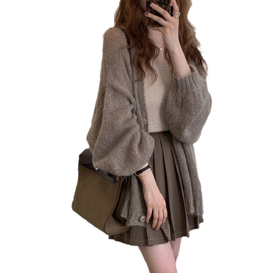 Damen Strickjacke im lässigen Oversized-Stil mit voluminösen Ärmeln und praktischen Taschen EB