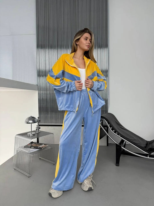 Damen Retro-inspiriertes Samt-Trackset mit Chevron-Design, Stehkragen und weiter High-Waist-Jogger Eichborn Berlin
